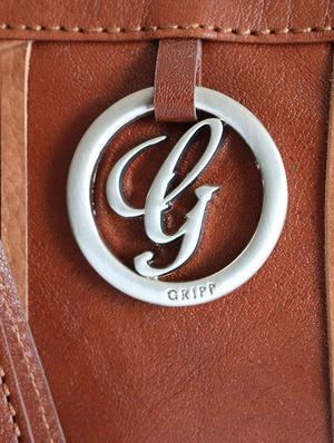 brown tassel trim leather clutch - 13678535 - Standard Image - 4