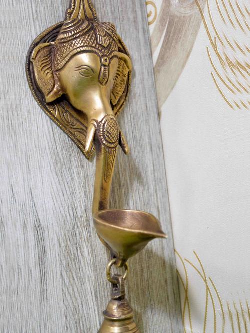 Wall Hanging Decorative Ganesha face with diya and bell Showpiece - 16465718 - Very Small Image - 1