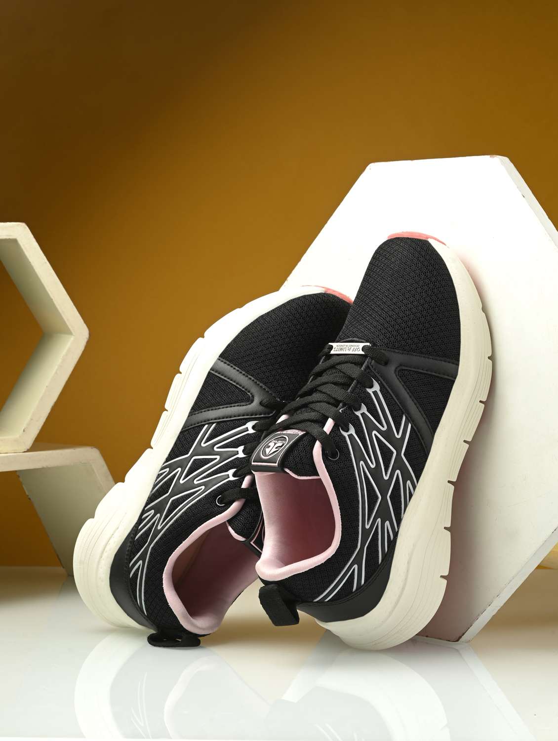 women black lace-up sports shoe
