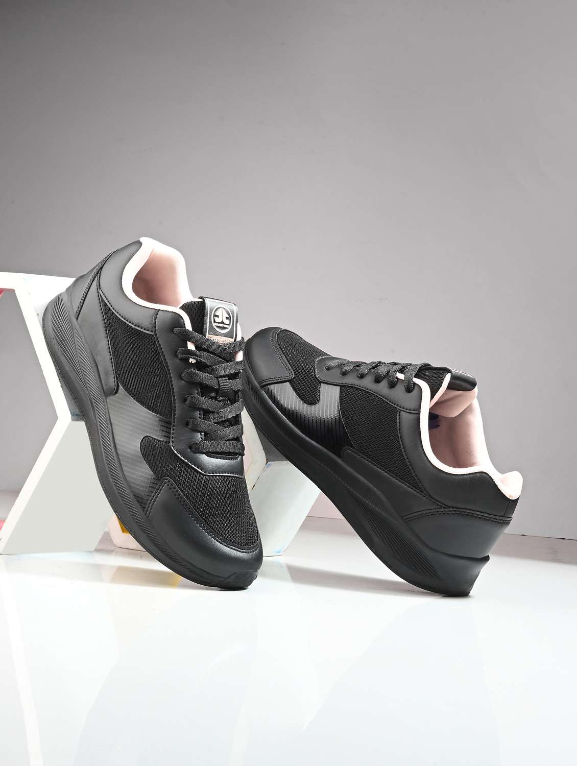 women black lace-up sports shoe