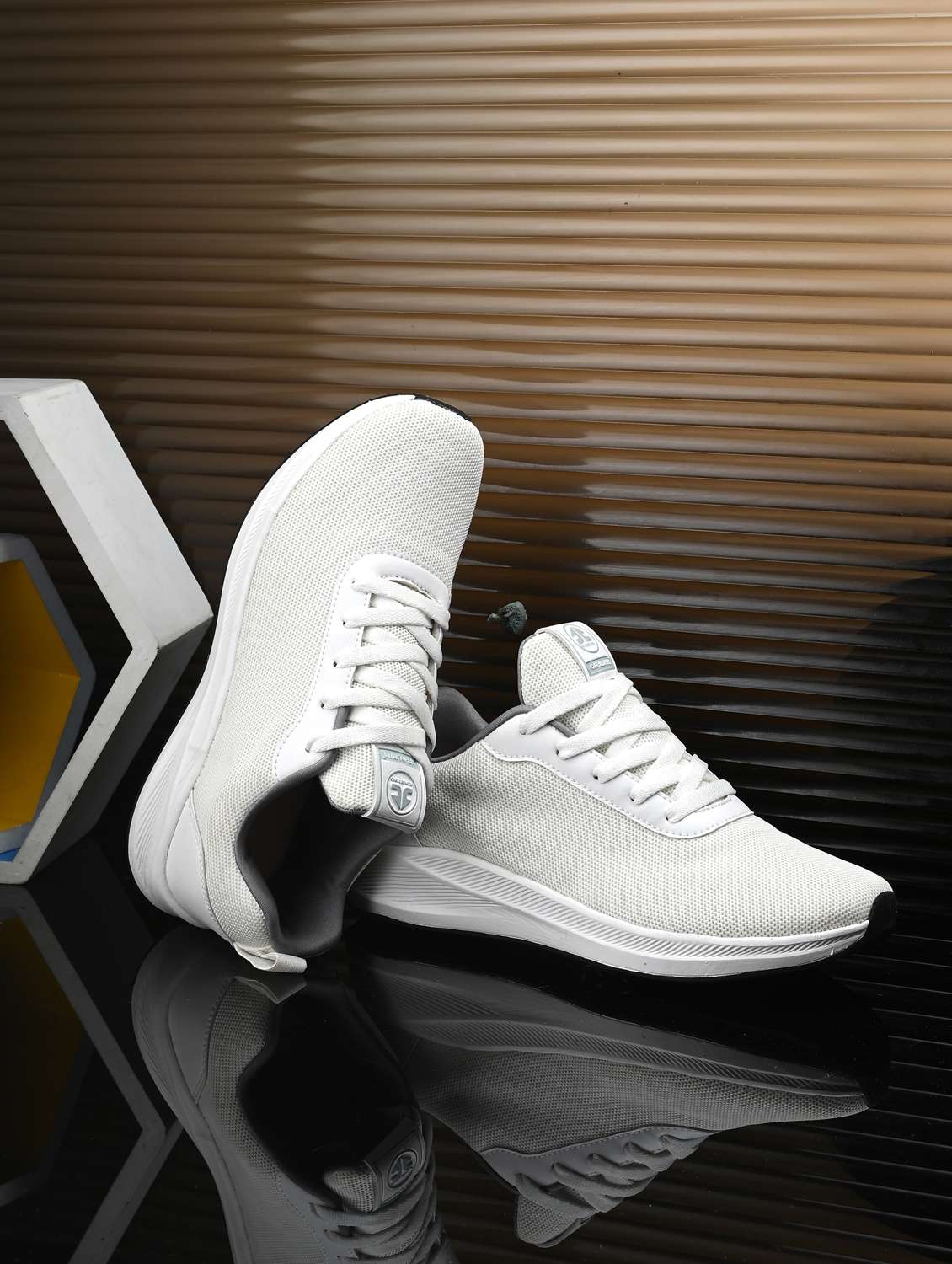 women off white slip on sports shoe