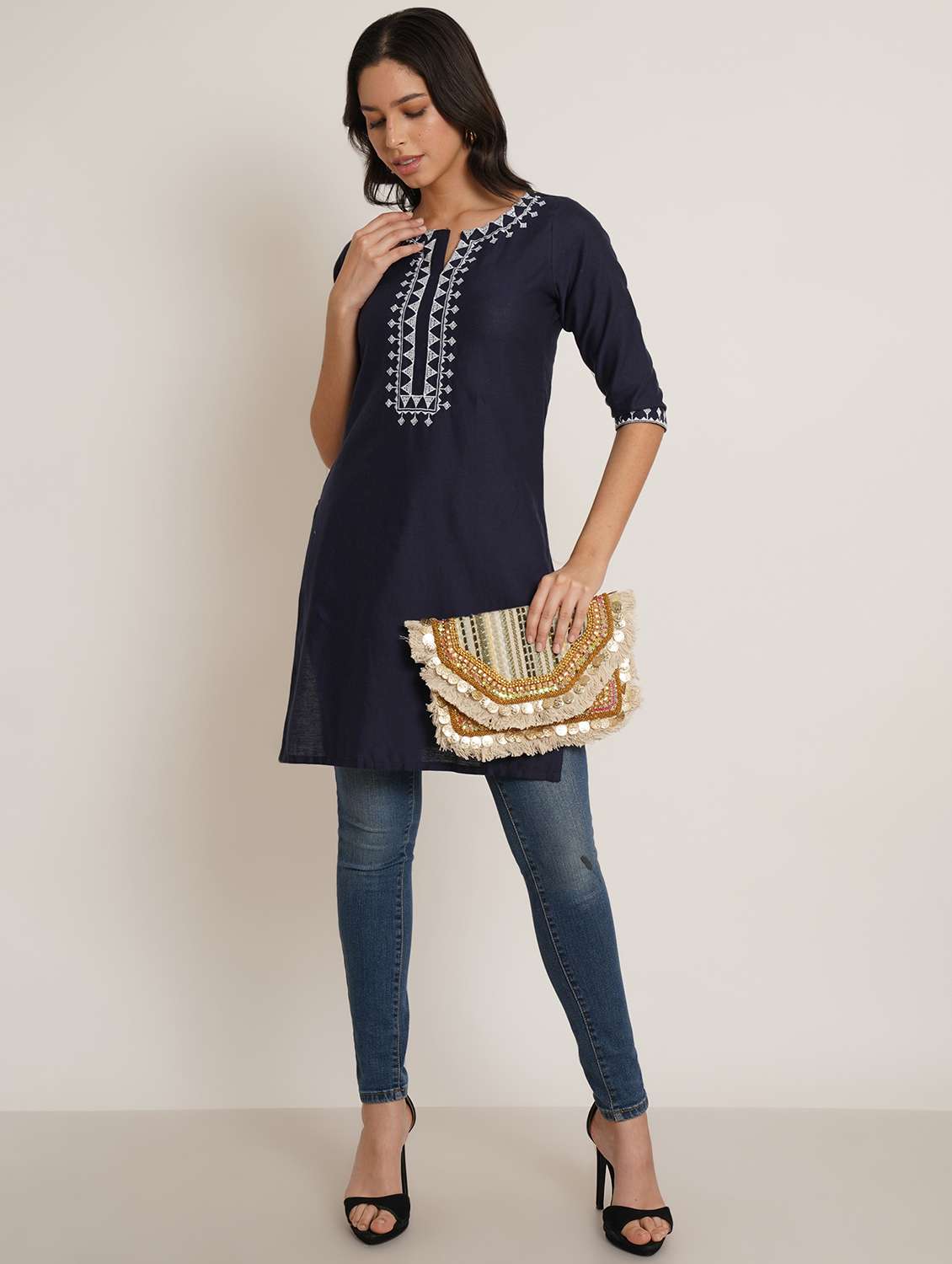 women embroidered three quarter sleeve straight kurti