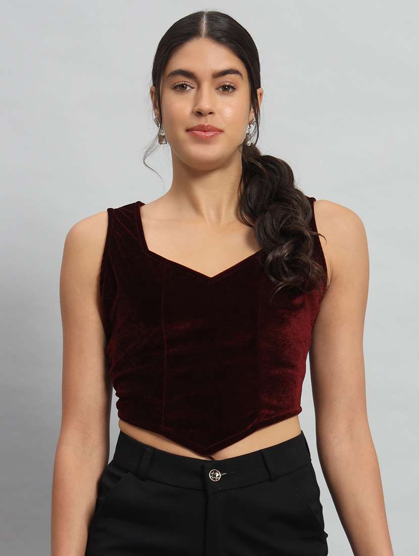 women solid sleeveless stitched blouse
