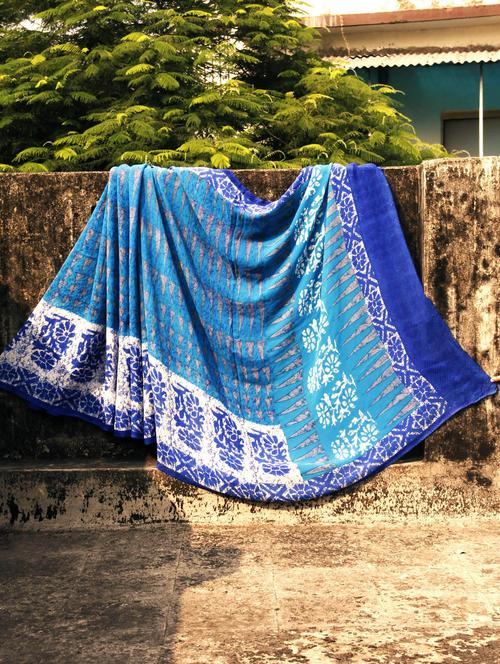 Stylish Georgette Saree In Shades Of Blue, With Matching Blouse Piece - Urvashi's