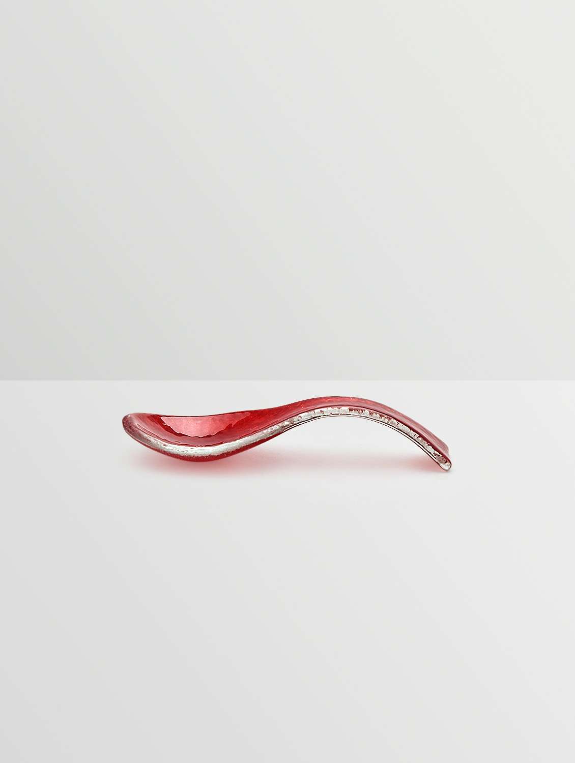 red glass spoon