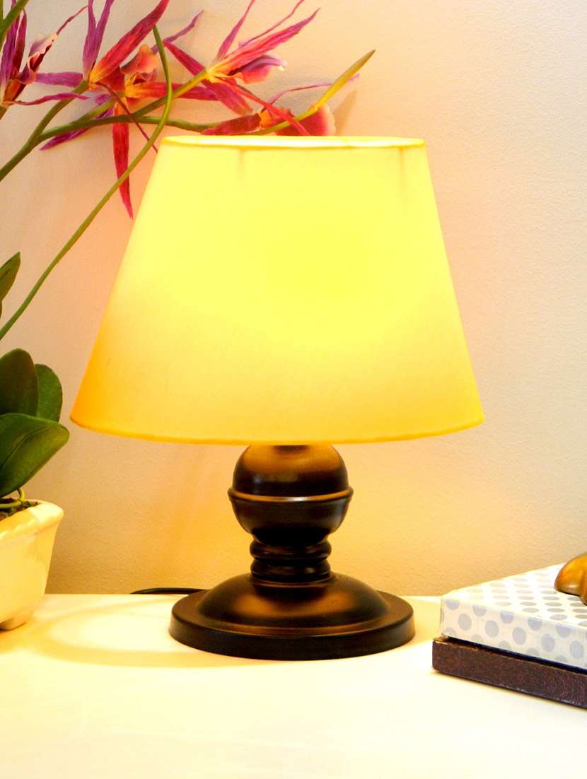 yellow metal and fabric table lamp