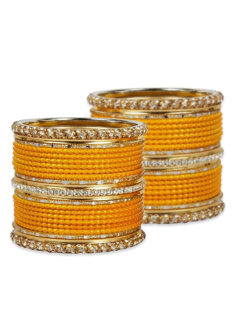 yellow metal bangle