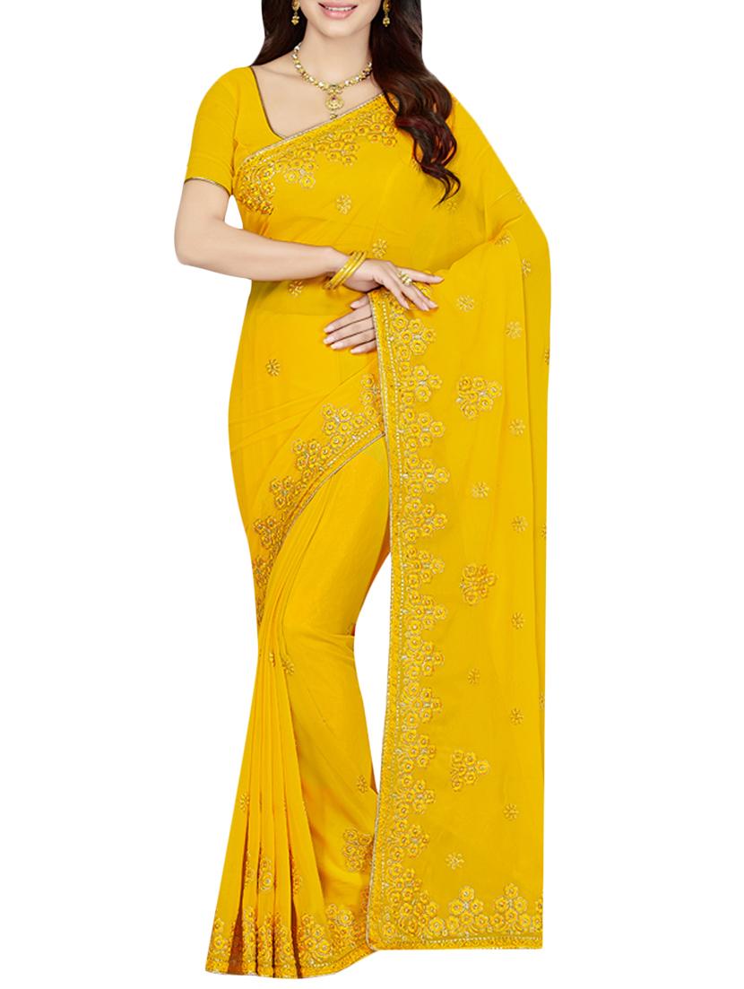 yellow embroidered georgette saree with blouse