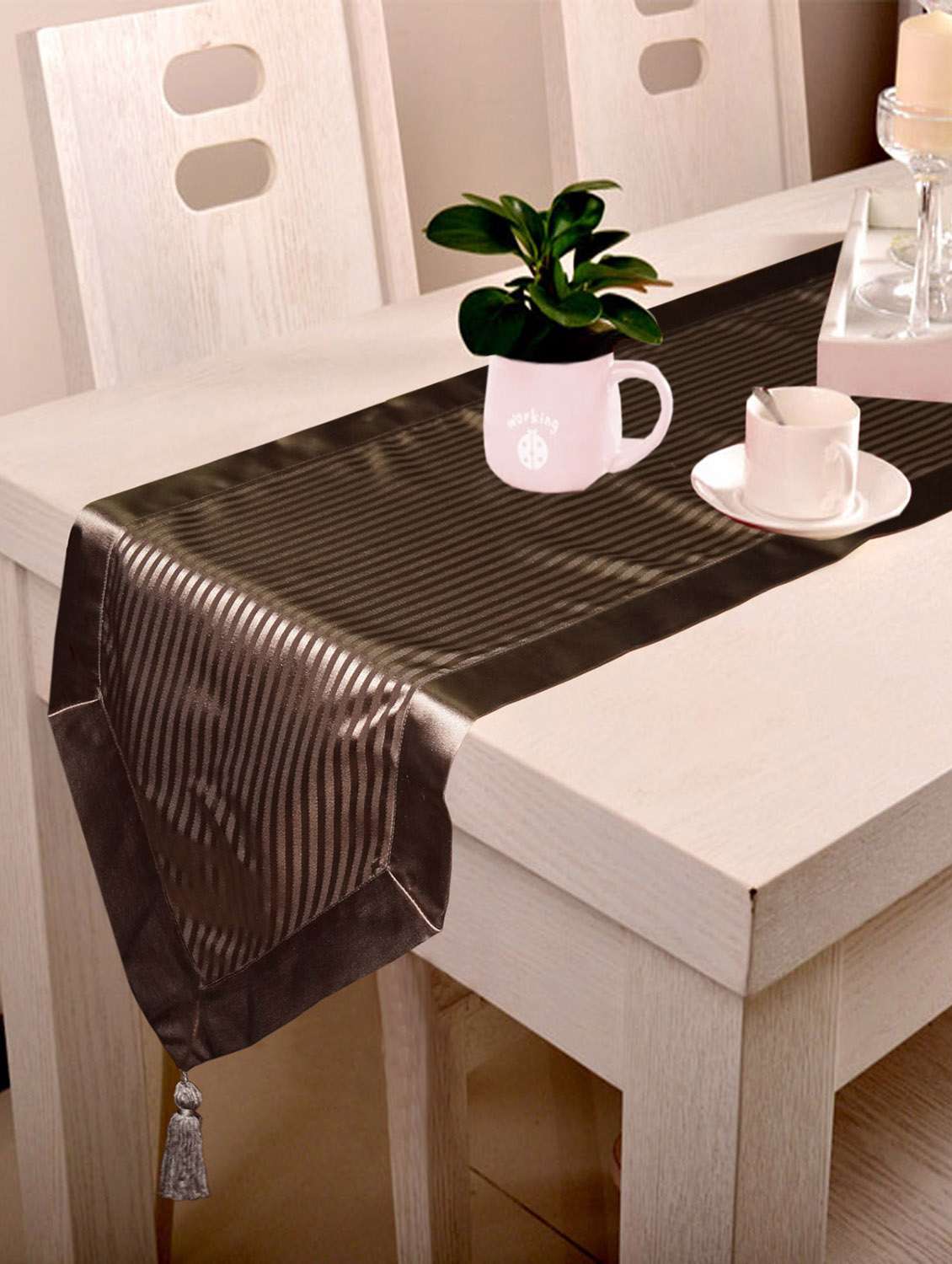 lushomes contemporary brown stripped runner with a hanging tussel