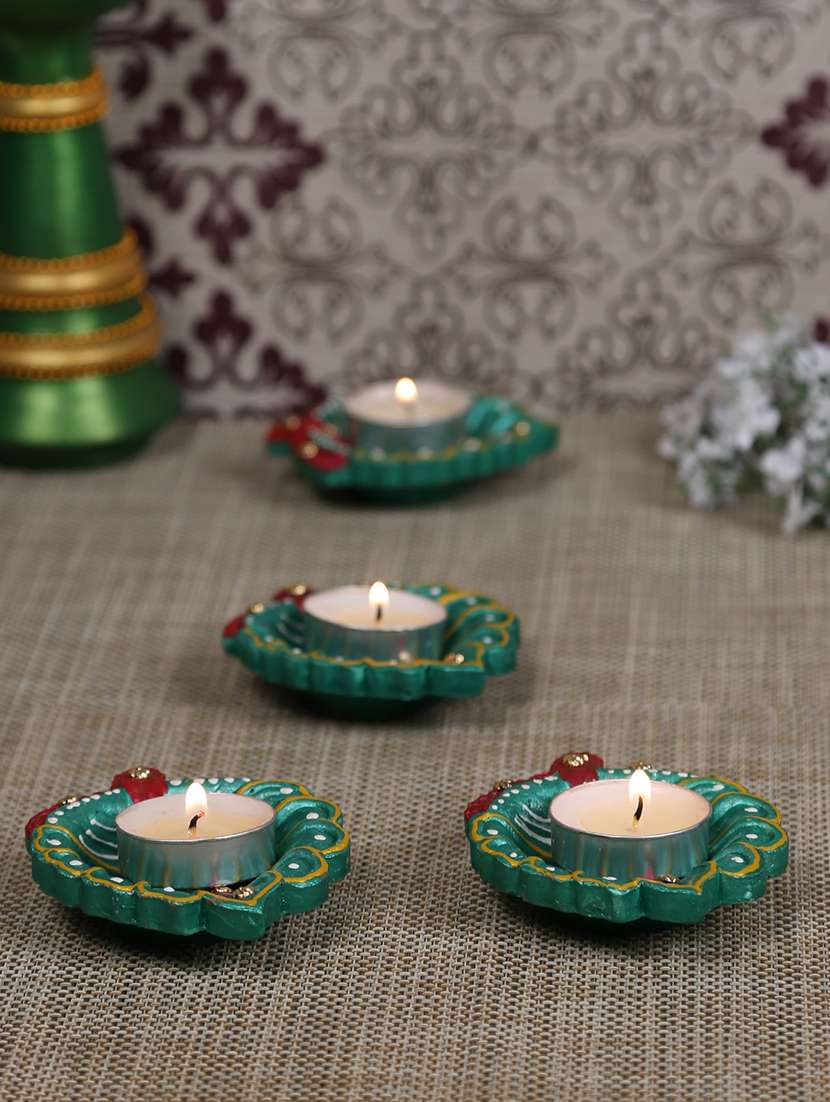 hand painted leaf shape floor diya set - set of 4