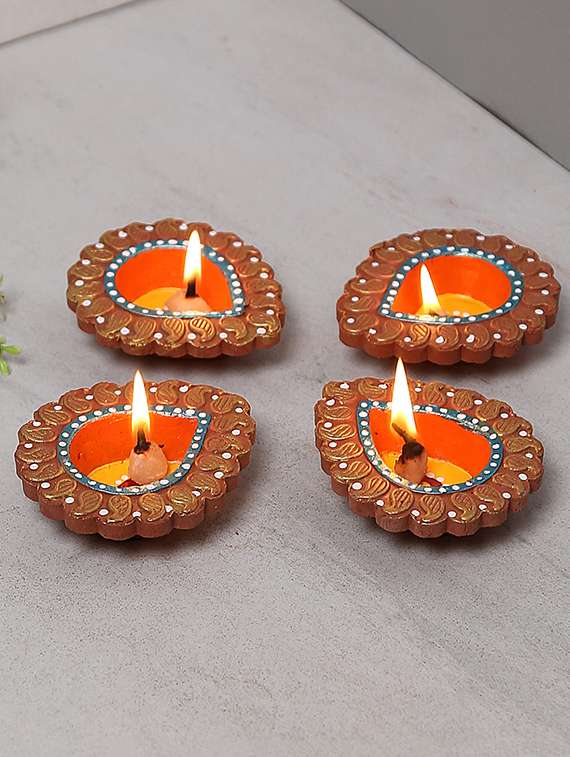 aapno rajasthan delicately carved terracotta diyas - set of 4