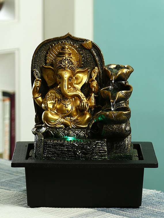 golden ganesh hand sculpted indoor water fountain with light