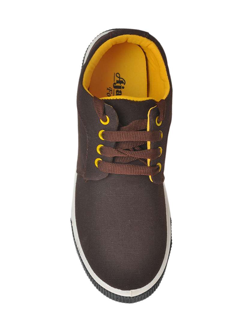 Buy online Ajanta Brown Canvas Sneakers from Casual Shoes for Men