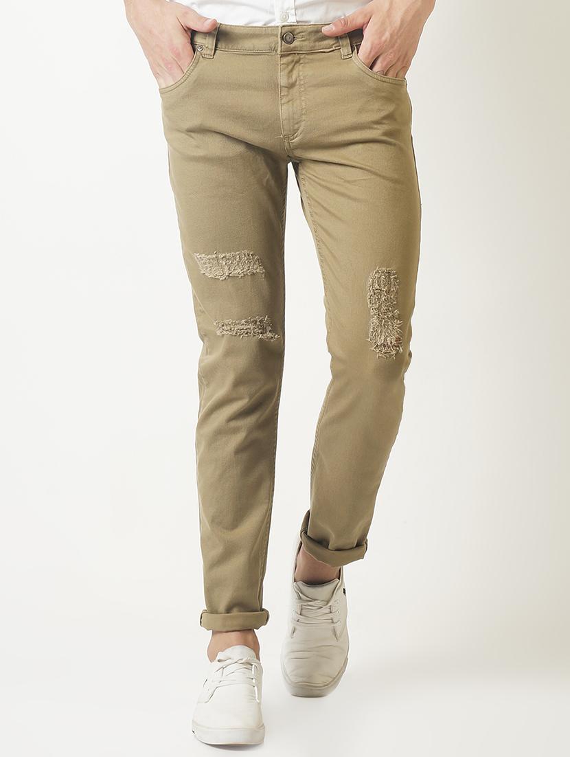 beige solid ripped jeans