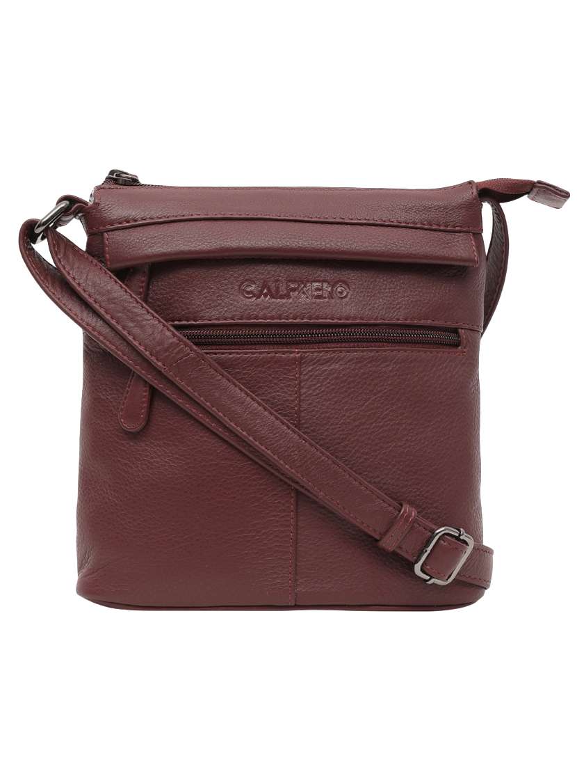 brown leather sling bag