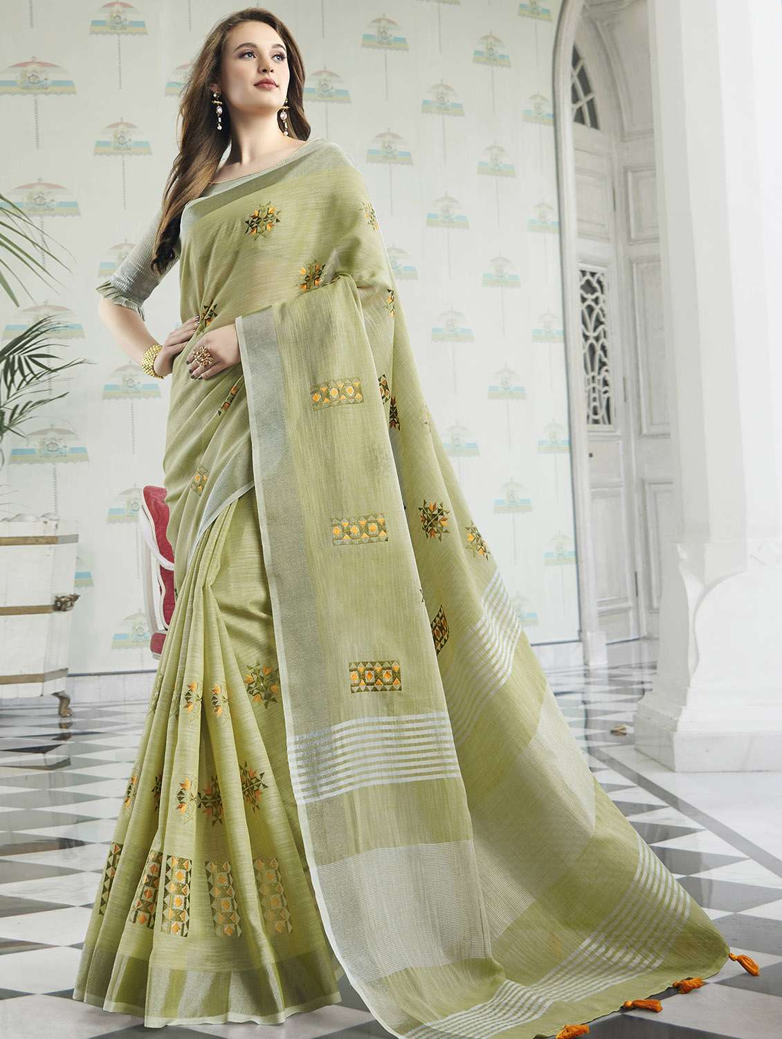 self design embroidered saree with blouse