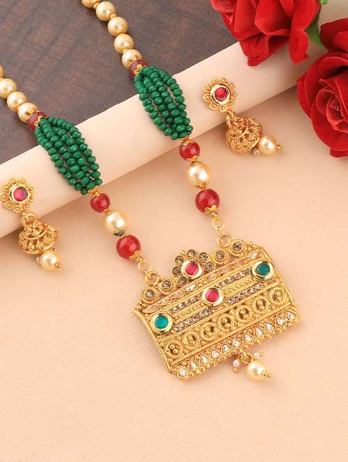 multi colored metal pendants and earring - 16931830 -  Standard Image - 0