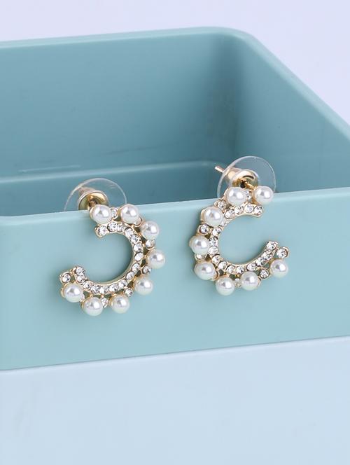 gold metal studs earring - 16995654 -  Standard Image - 0