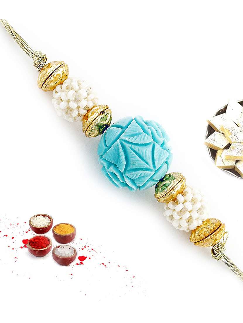 turquoise coral rakhi with pearl balls