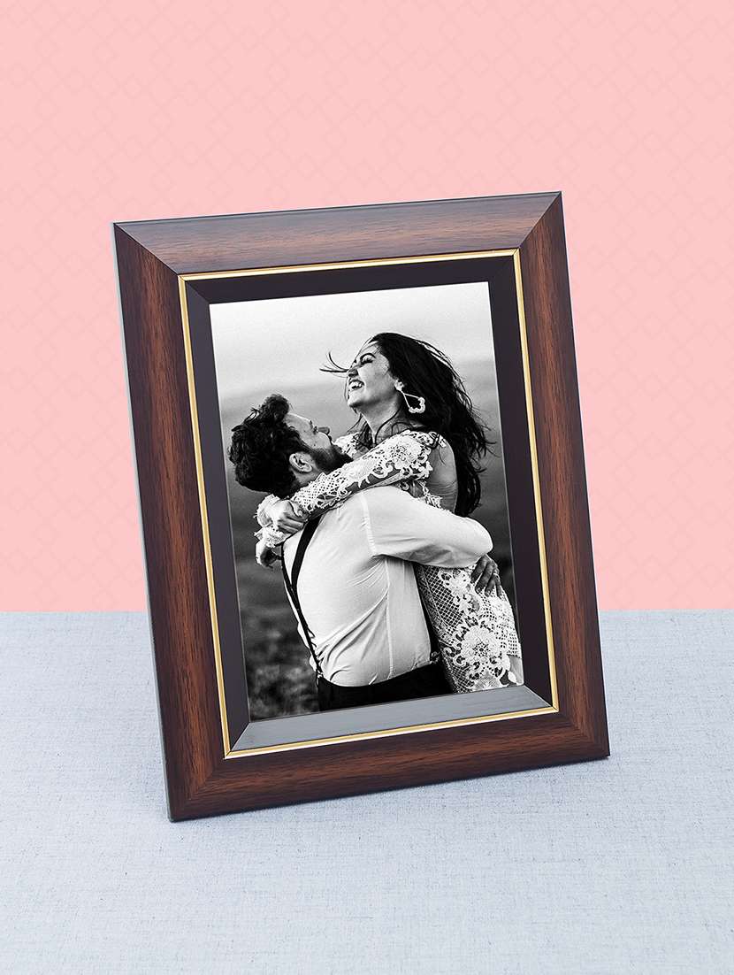 brown color golden border table photo frame