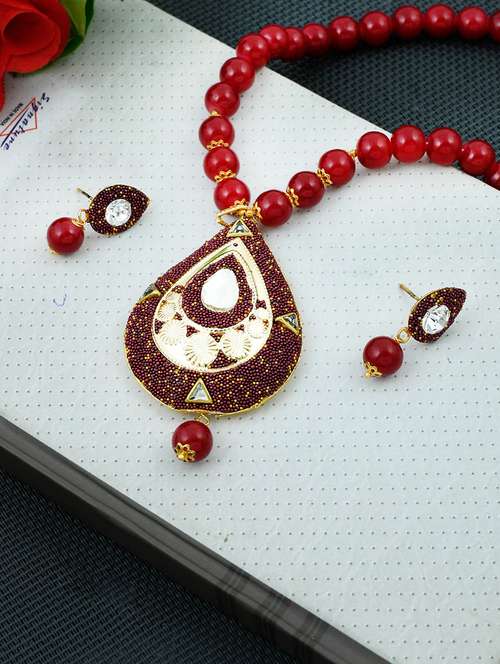 gold brass necklaces and earring - 17354641 - Standard Image - 0