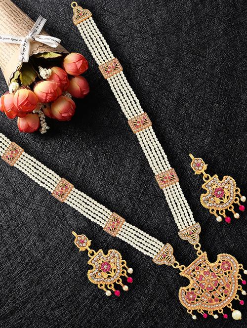 gold metal necklaces and earring - 17456205 - Standard Image - 0