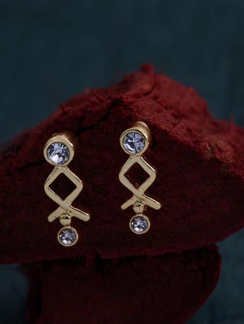 gold metal studs earring - 17542982 -  Standard Image - 0