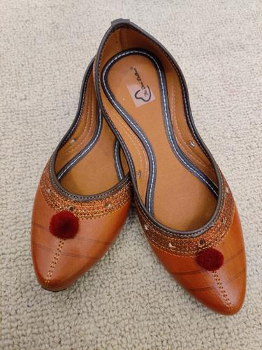 tan women ethnic juti  - 17554690 -  Standard Image - 0