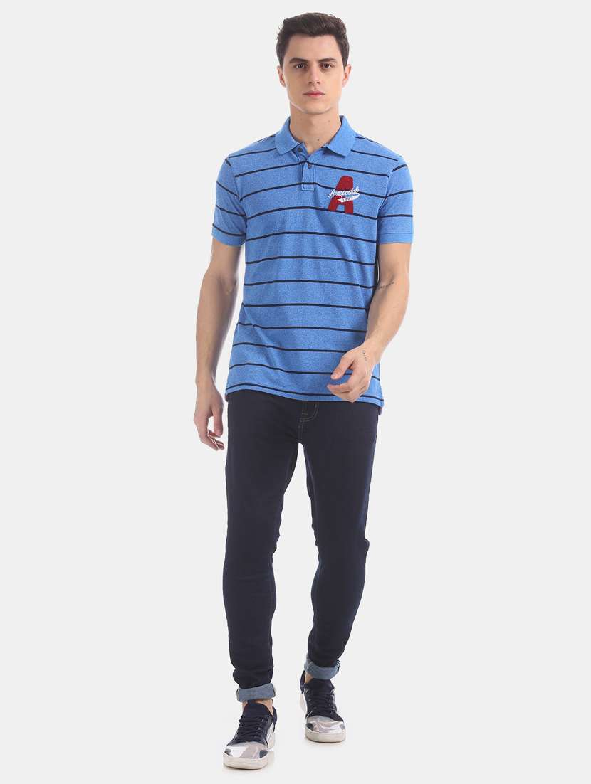 blue striped polo t-shirt  - 17625729 -  Standard Image - 3
