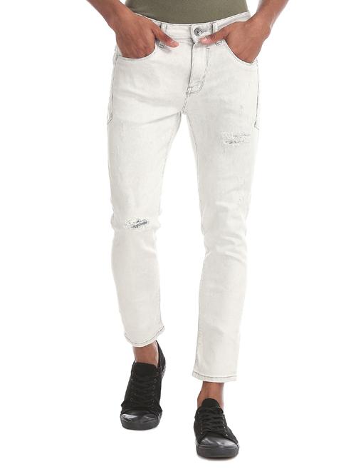 white distressed denim jeans  - 17742408 -  Standard Image - 0