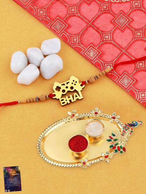 red gold plated thread rakhi with roli chawal kankawati thali and greeting card - 17900807 - Standard Image - 0