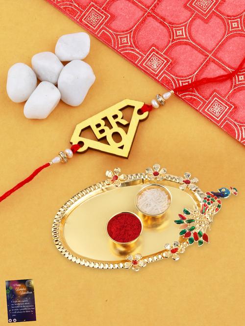 red gold plated thread rakhi with roli chawal kankawati thali and greeting card  - 17900808 -  Standard Image - 0