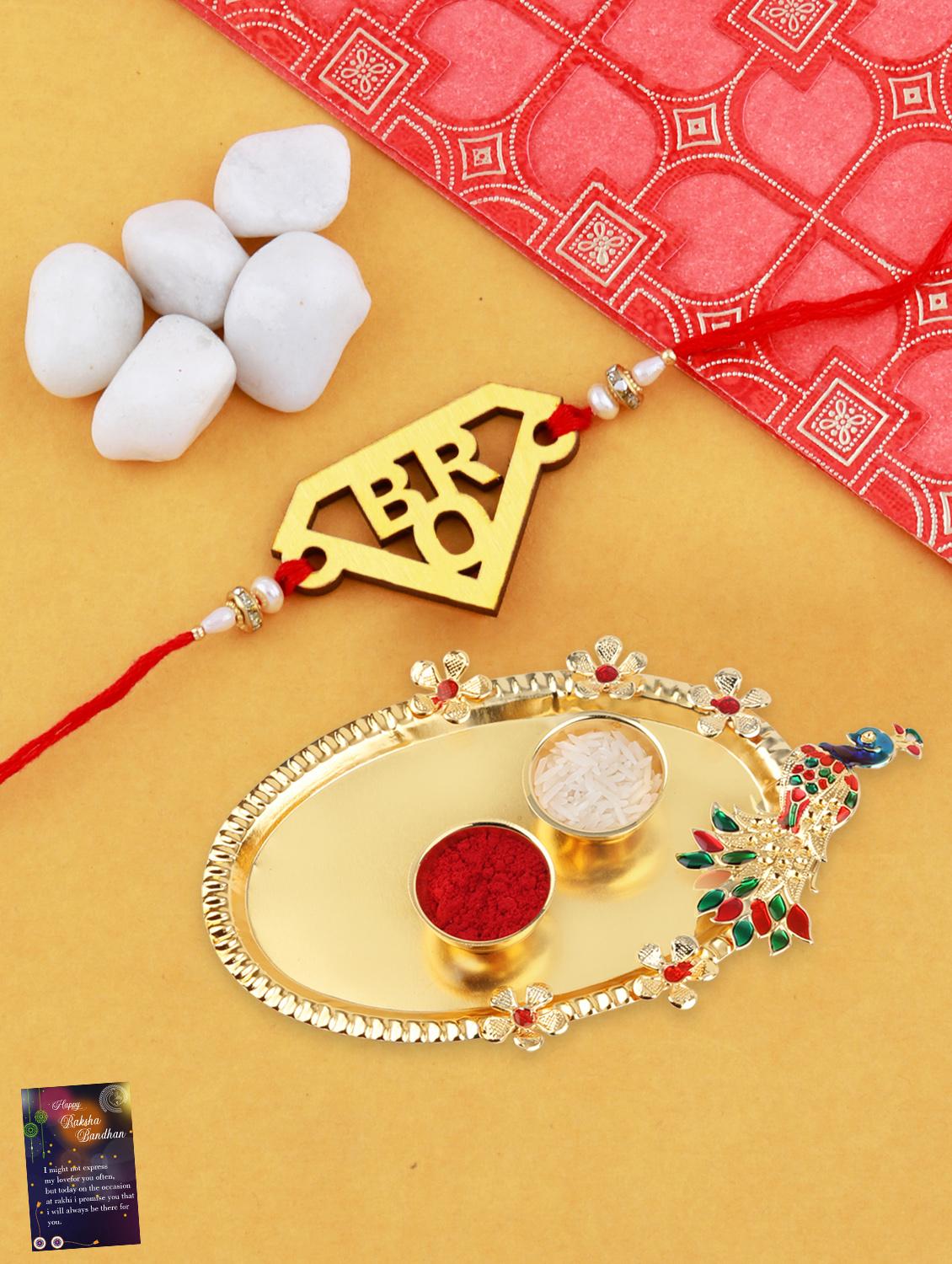 red gold plated thread rakhi with roli chawal kankawati thali and greeting card  - 17900808 -  Zoom Image - 0