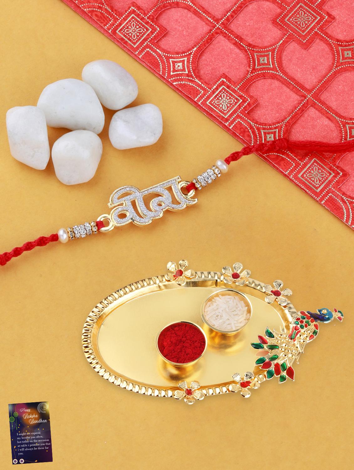 red gold plated thread rakhi with roli chawal kankawati thali and greeting card  - 17900830 -  Zoom Image - 0