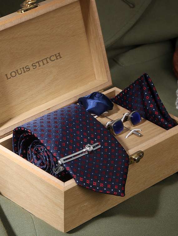 blue dotted pattern feel silk that is soft, rich in colour and beautiful to feel. the stitching thread are well finished. premium heavy quali interlining gets a perfect knot everytime. loved worldwide for sle ty