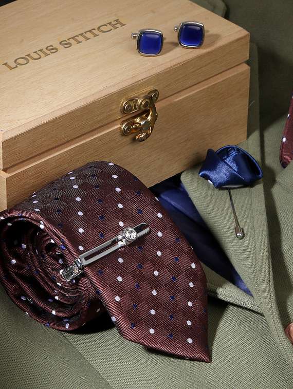 brown polka feel silk that is soft, rich in colour and beautiful to feel. the stitching thread are well finished. premium heavy quali interlining gets a perfect knot everytime. loved worldwide for sle ty