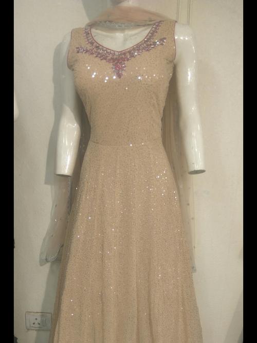 ladies gowns gold color - 18216362 - Standard Image - 0