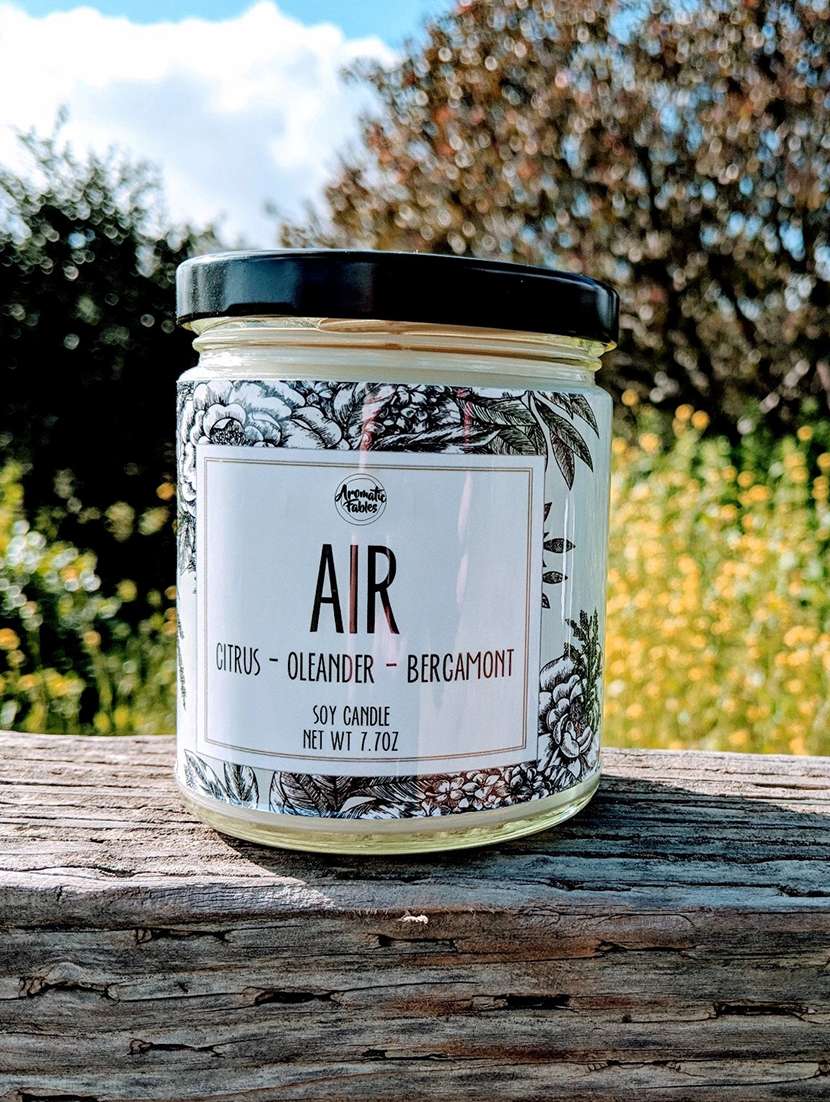 elements of earth air scented white color glass jar candle