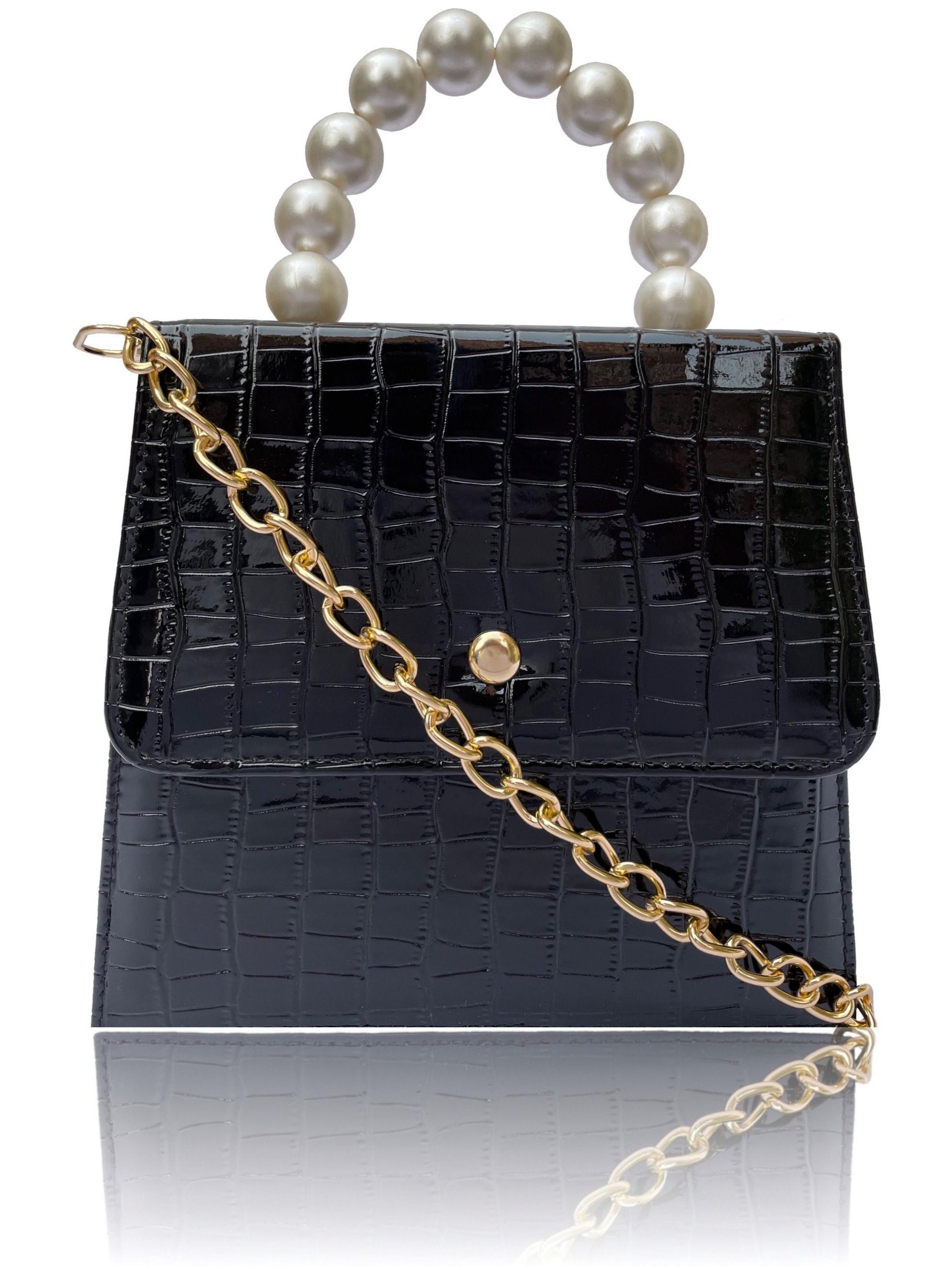 this sling bag from the house - 18323242 - Zoom Image - 0