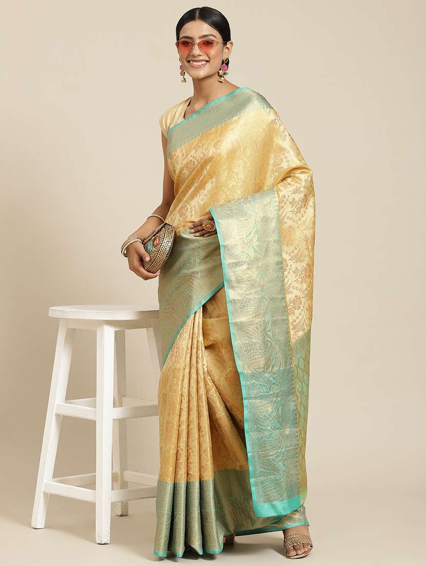 women's self design beige colored saree