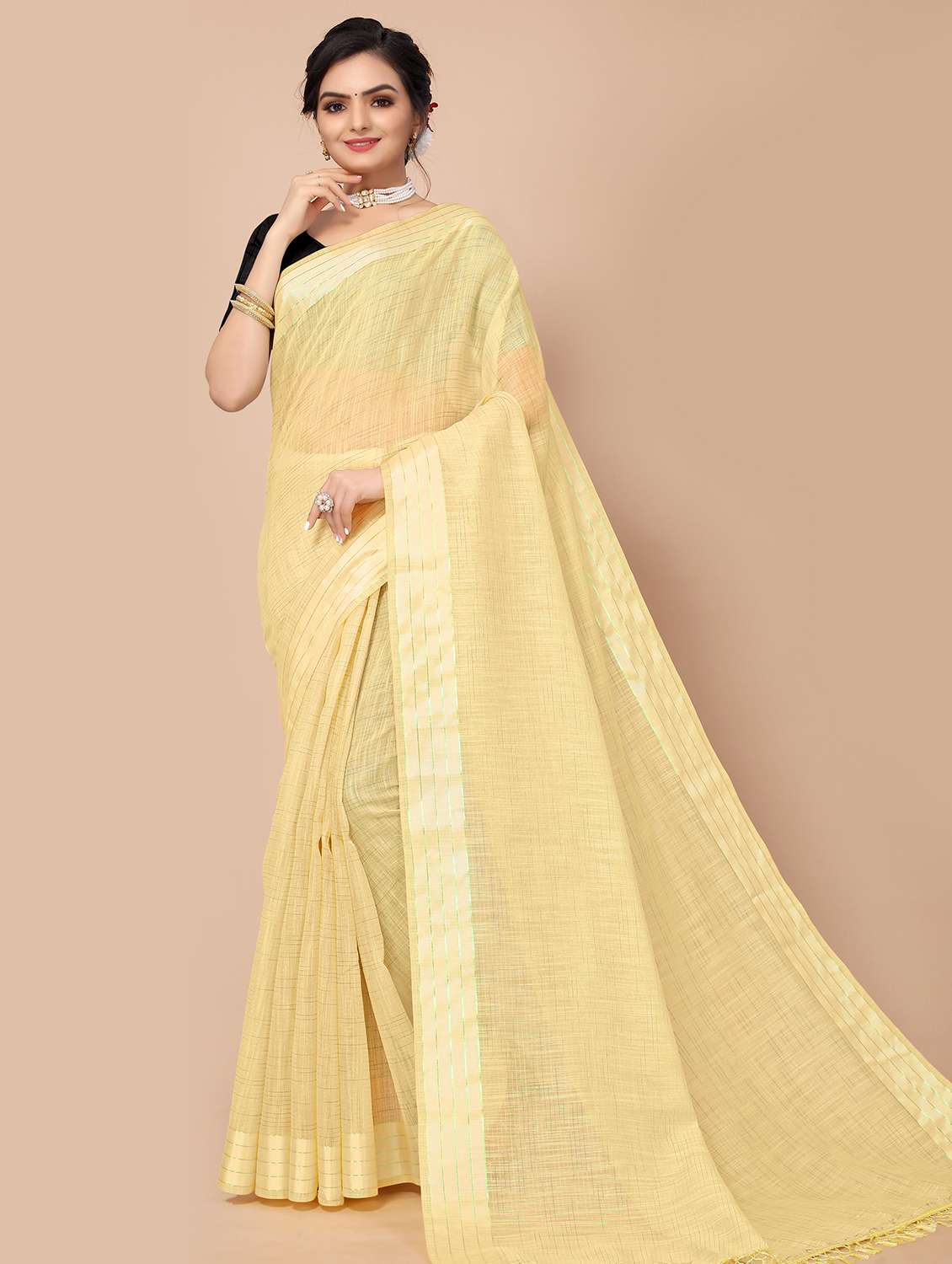 women's bordered yellow colored saree with blouse