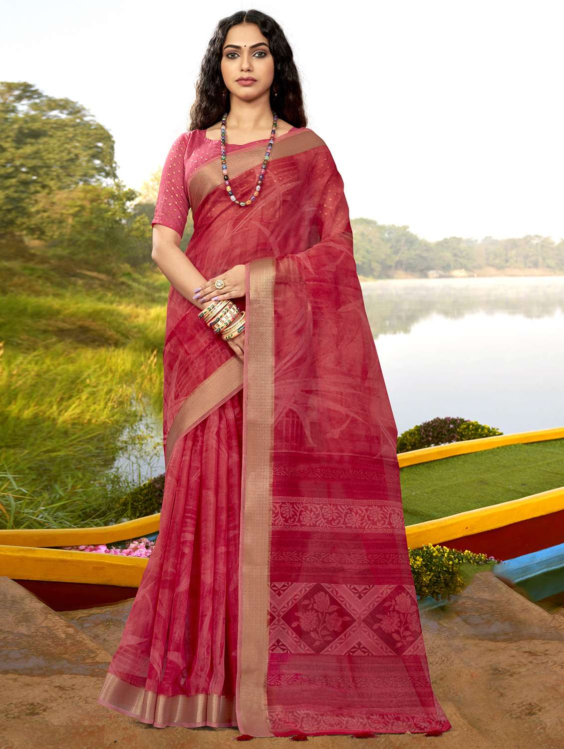 contrast bordered self design woven saree with blouse