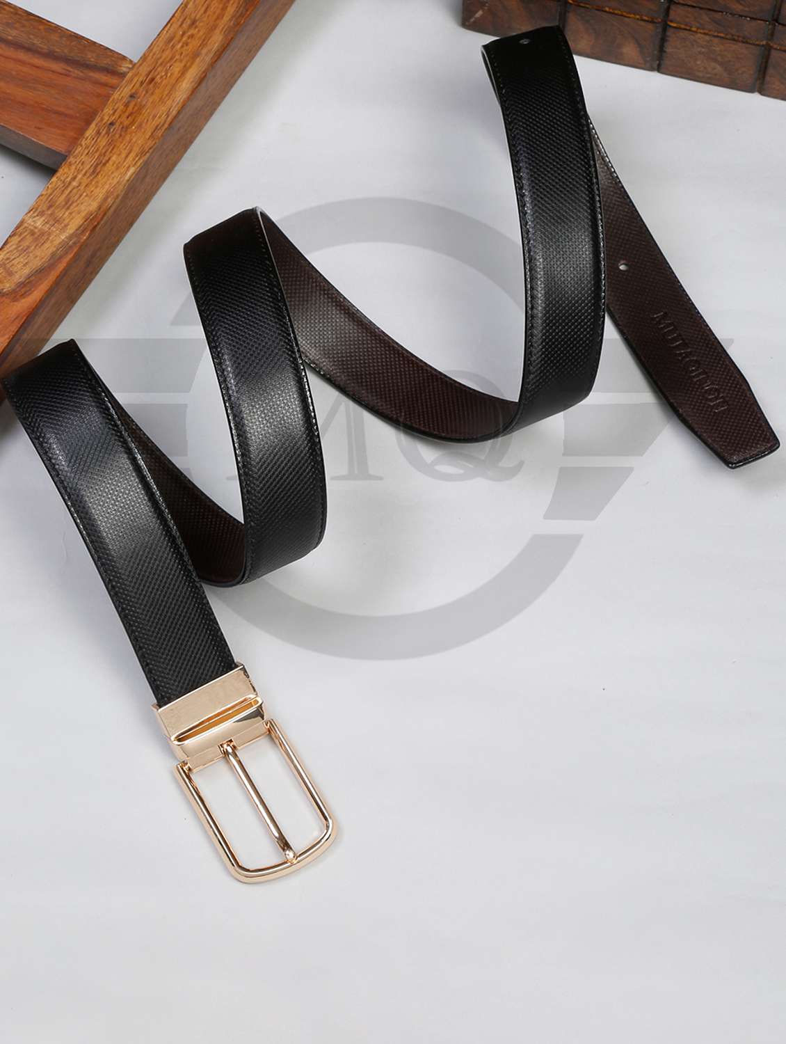 dotted black leather belt