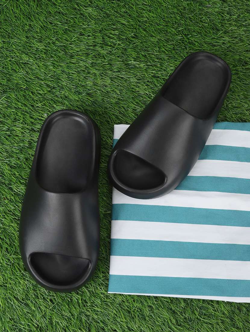 women black solid slides 