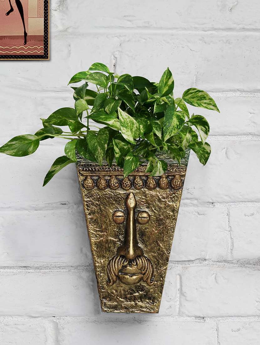metalic golden with green v shape face planter