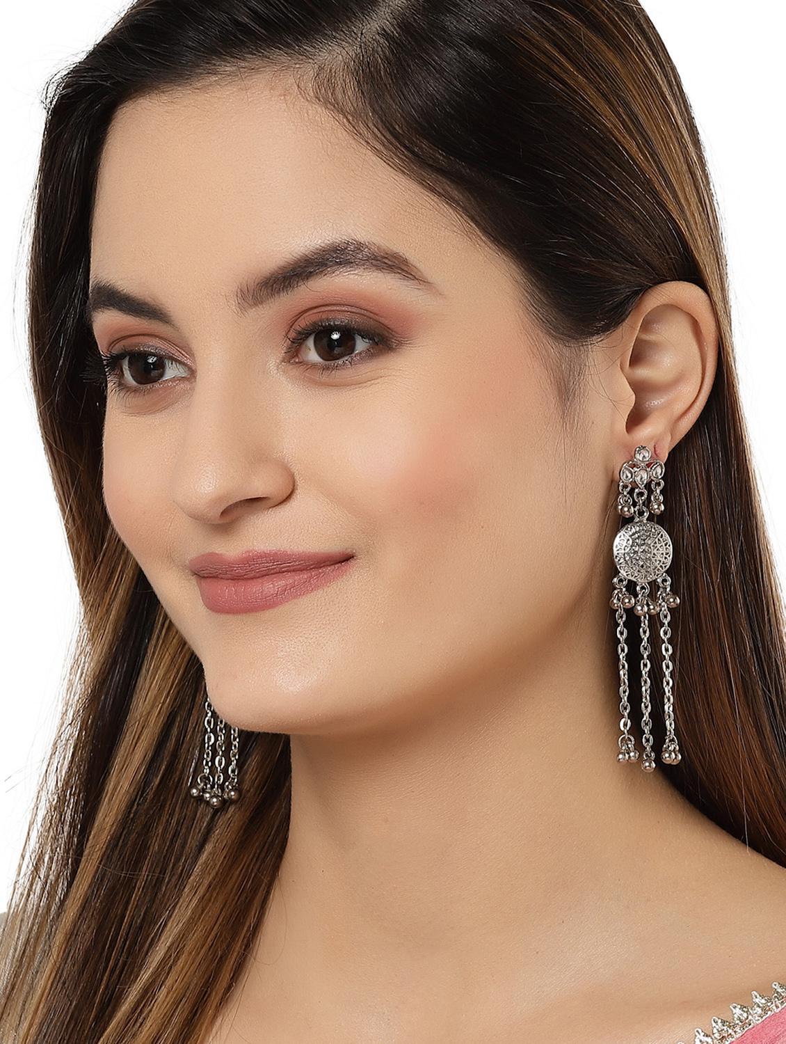 silver metal earring - 18633219 - Standard Image - 3