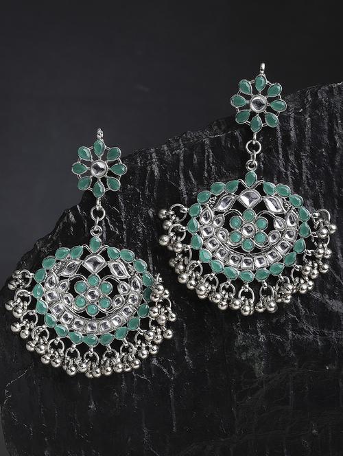 green metal earring - 18633275 - Standard Image - 0