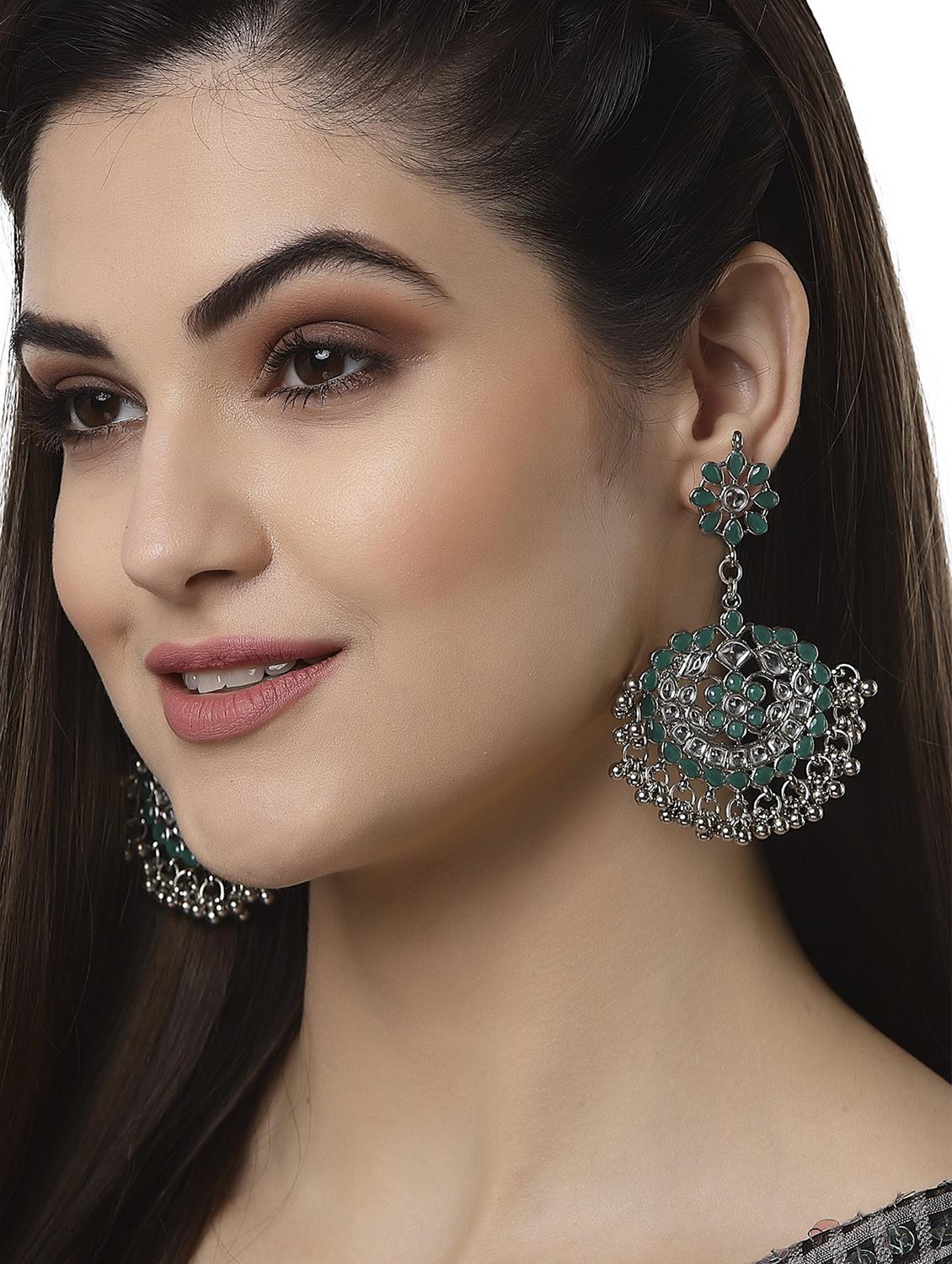 green metal earring - 18633275 - Standard Image - 3