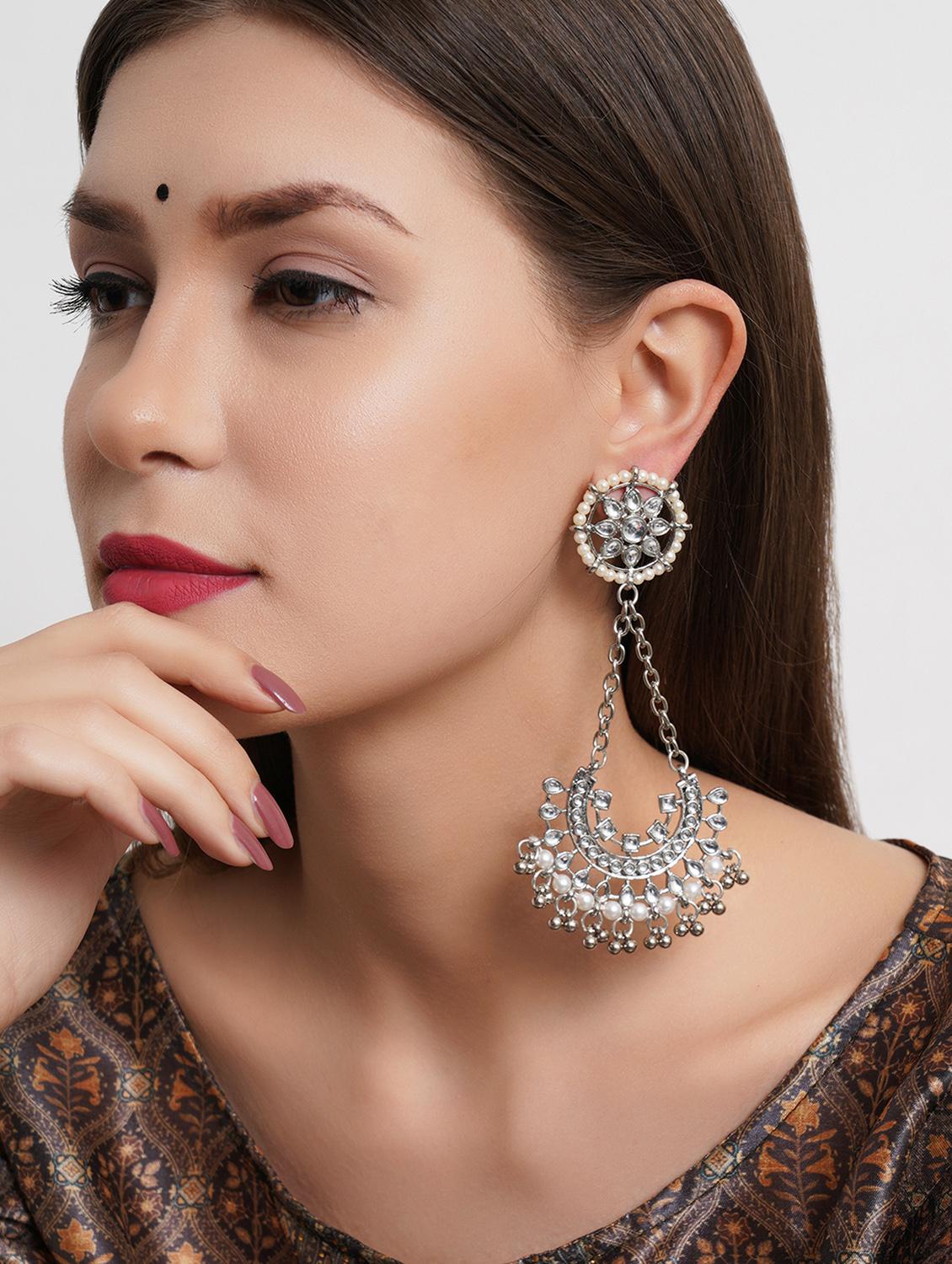 silver metal earring - 18633431 - Standard Image - 3