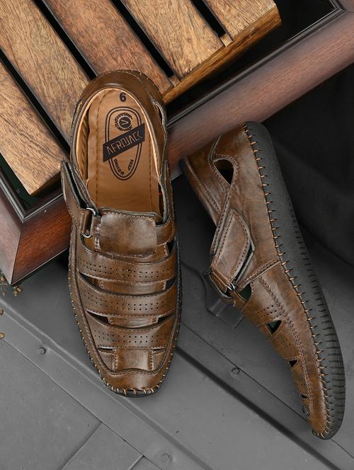 brown slip on sandal  - 19184863 -  Standard Image - 0